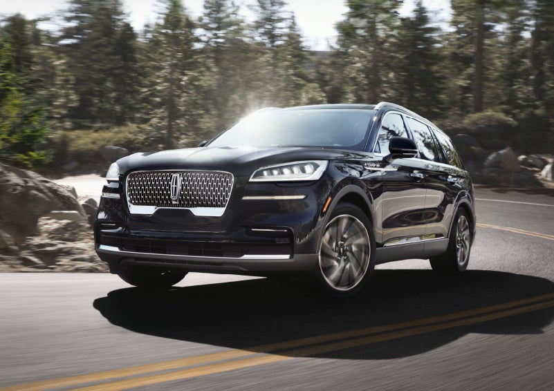 A Lincoln Aviator® SUV is being driven on a winding mountain road | Krenzen Lincoln in Duluth MN