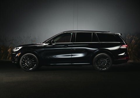 A 2024 Lincoln Aviator® SUV is shown in the Infinite Black exterior color | Krenzen Lincoln in Duluth MN