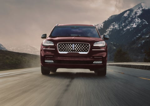 A 2024 Lincoln Aviator® SUV is shown in the Diamond Red exterior color. | Krenzen Lincoln in Duluth MN