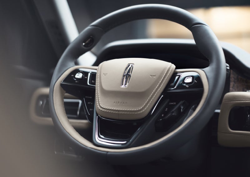 The intuitively placed controls of the steering wheel on a 2024 Lincoln Aviator® SUV | Krenzen Lincoln in Duluth MN