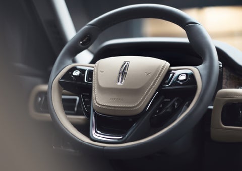 The intuitively placed controls of the steering wheel on a 2024 Lincoln Aviator® SUV | Krenzen Lincoln in Duluth MN