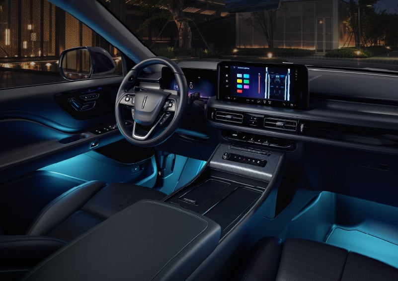Deep blue ambient lighting glows from various places within a 2026 Lincoln Aviator® SUV. | Krenzen Lincoln in Duluth MN