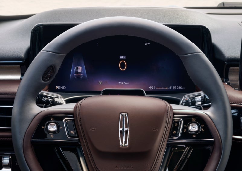 The driver’s information cluster display behind the steering wheel is shown. | Krenzen Lincoln in Duluth MN