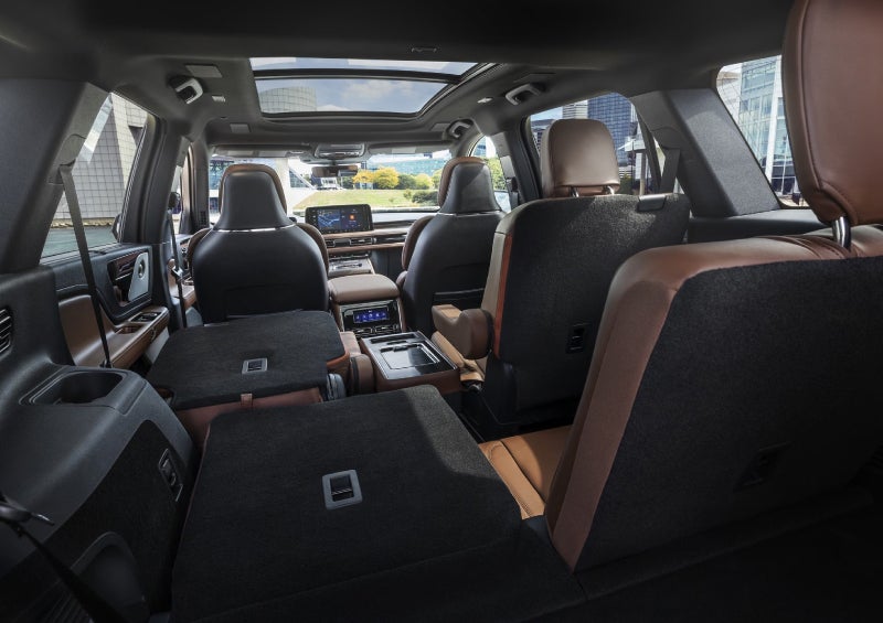 One side of the PowerFold® third-row seat and a second-row seat are folded forward in the 2026 Lincoln Aviator® SUV. | Krenzen Lincoln in Duluth MN