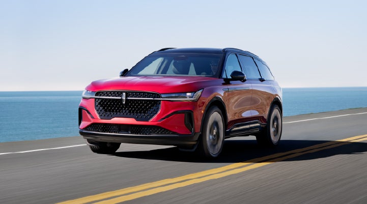 A 2026 Lincoln Nautilus® SUV is being driven on a seaside roadway. | Krenzen Lincoln in Duluth MN