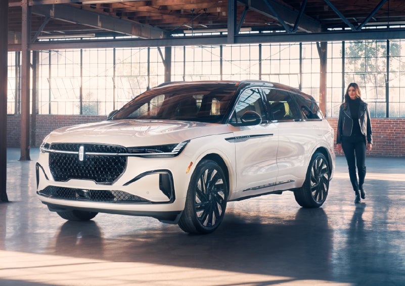 A person approaches a 2026 Lincoln Nautilus® SUV. | Krenzen Lincoln in Duluth MN