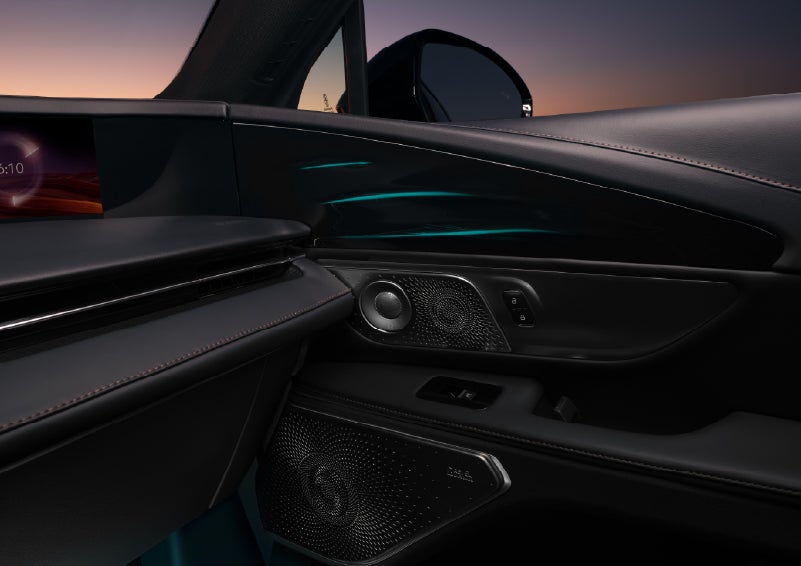 Selectable ambient lighting glows in the passenger door panel. | Krenzen Lincoln in Duluth MN